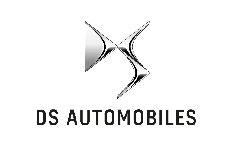 2026-DS-Automobiles - VPS Learning Logo with a shiny silver X-shaped emblem centered on a black abstract background; a sleek corporate mark.