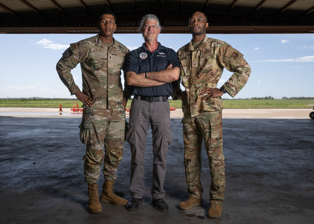 Workforce Transition and Up-Skilling - VPS Learning From left to right, U.S. Air Force 1st Lt. Nehemiah Jackson, 375th Contracting Flight officer in charge, Brett Kollar, Civil Air Patrol pilot instructor, and Master Sgt. Alex Gavon, 343rd Training Squadron flight chief, pose for a photo in Denton, Texas,